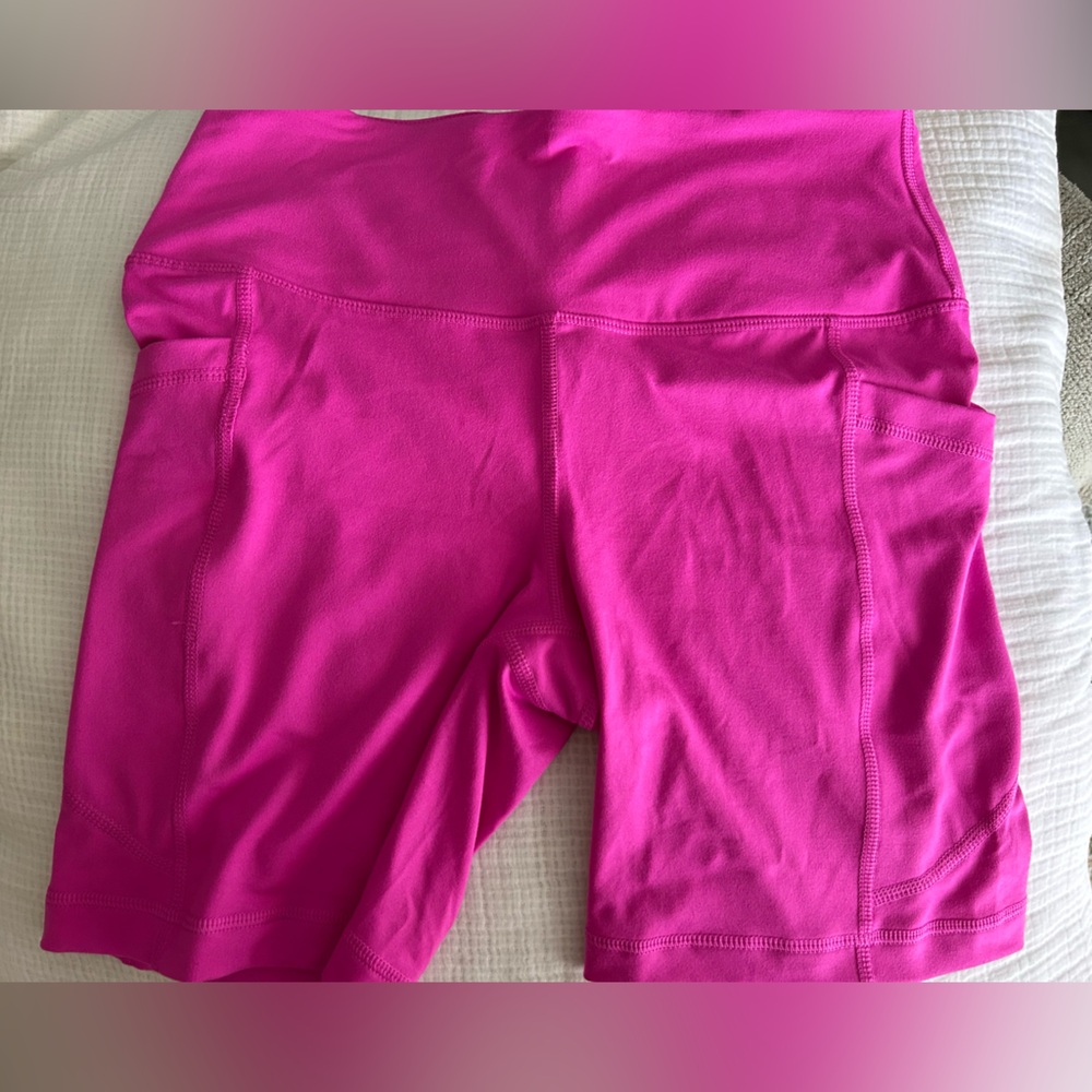 Hot pink bike shorts by Velocity. Never worn.